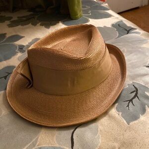 Tan hat stylish  straw. With bow